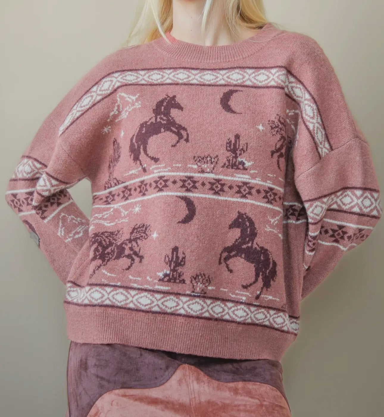 Pony up sweater