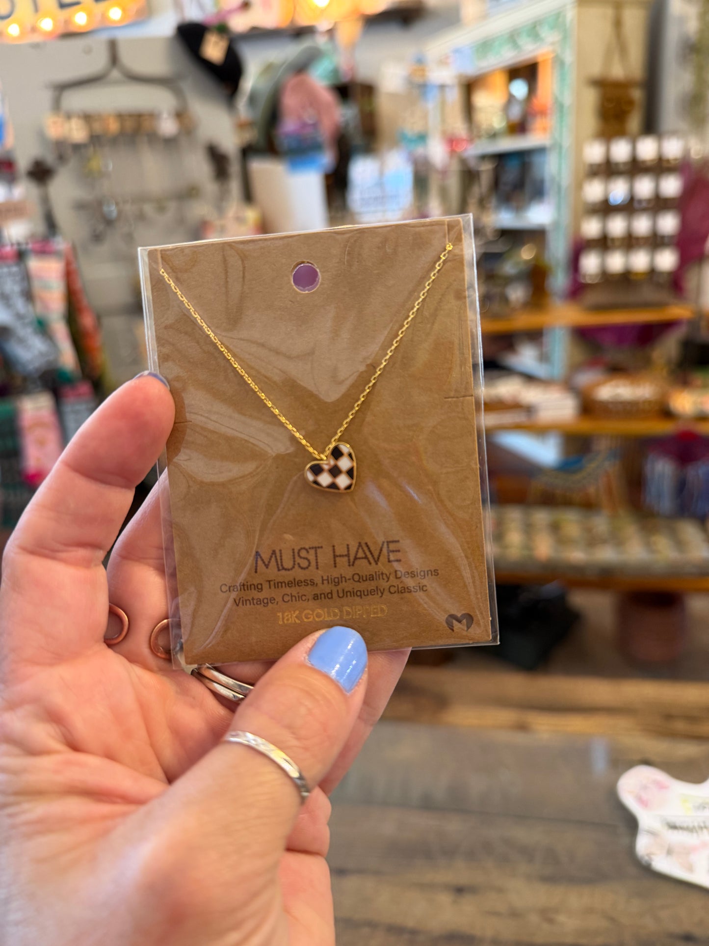 Heart check necklace