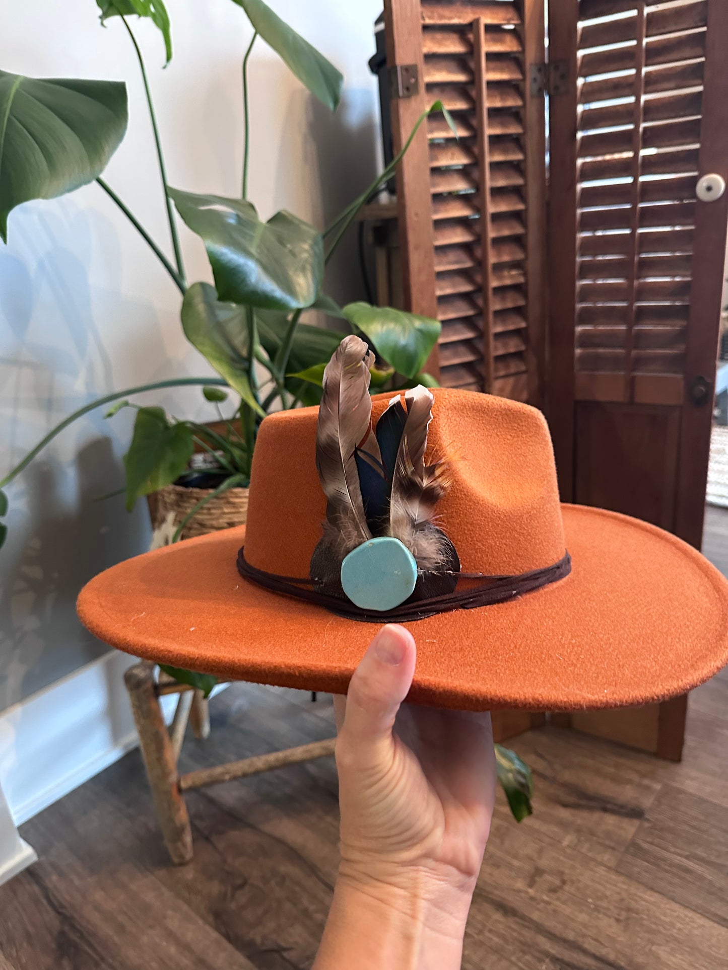 Something in the orange hat