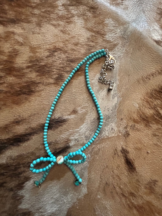 Faux Navajo teal bow