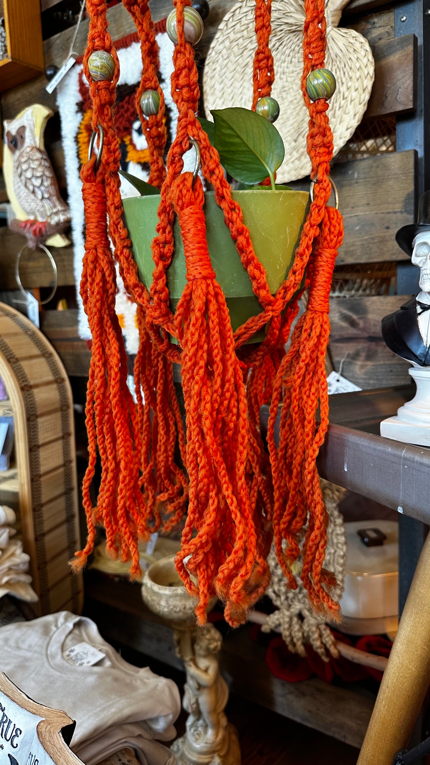 Orange macrame w/plant