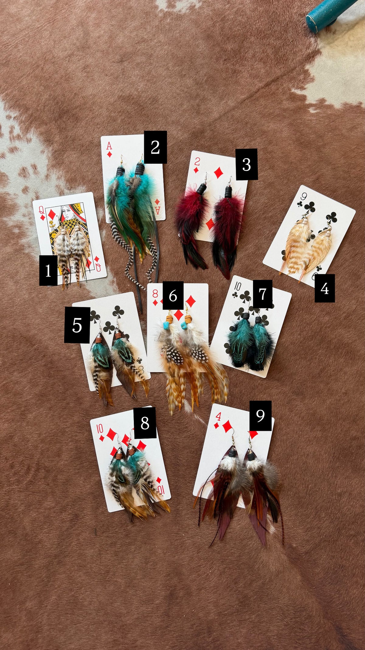 Farrah feather earrings