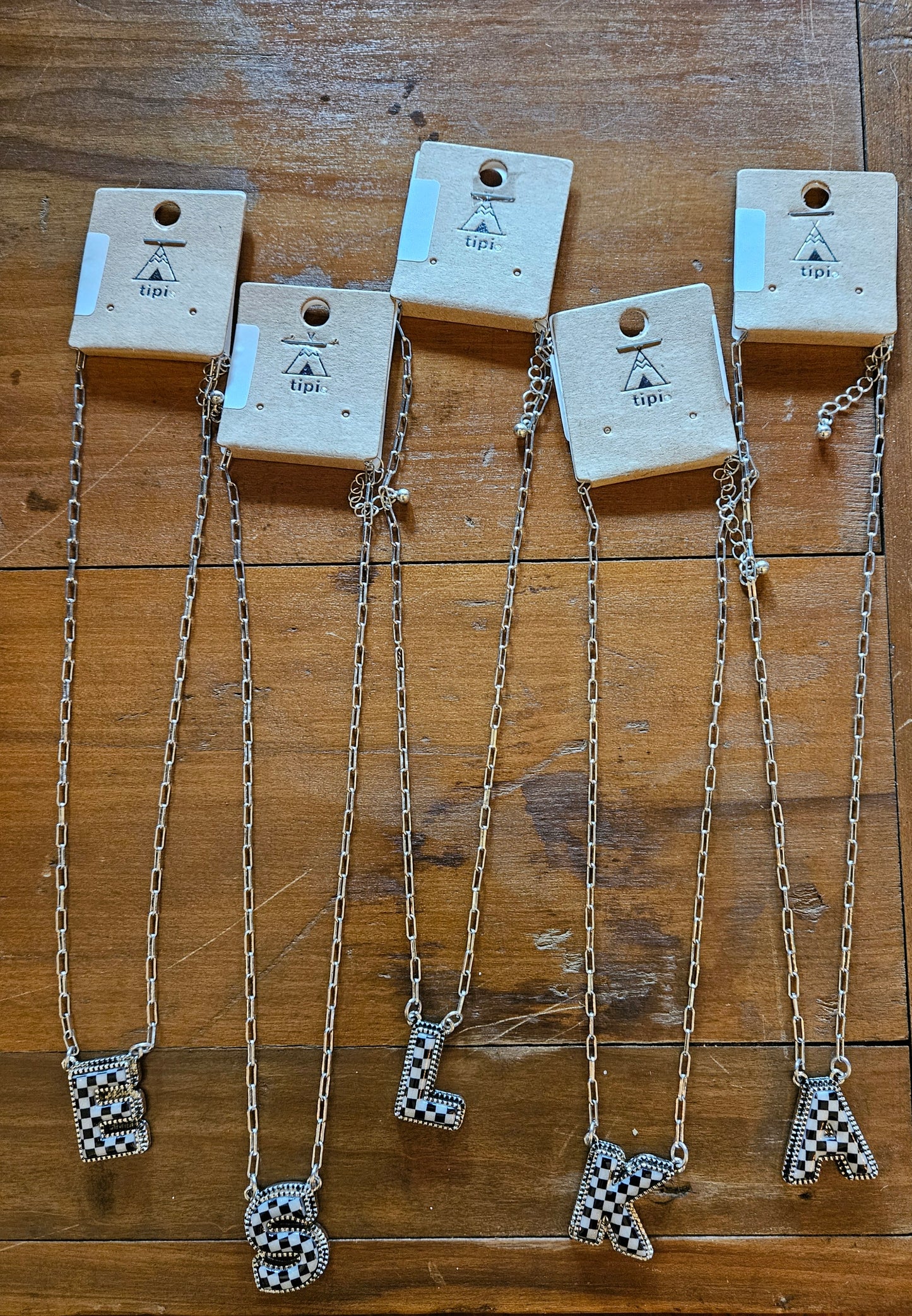 Check letter necklace